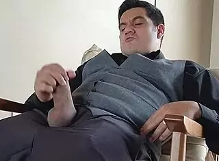 Yuri Gaicho shows off his big gay dick, masturbating solo in front of the mirror.