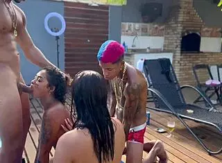 A couple swap in the pool with wife and young friend