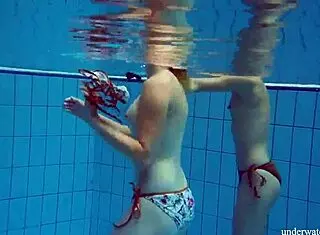 Marusia and Melisa Darkova Strip Underwater in Bikini Lesbian Show!