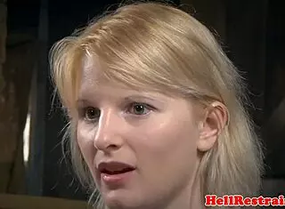 The bound sub feels suspended by her maledom master with dildo spreading