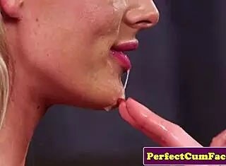 Big titted babe in stockings tugs cock for facial cumshot