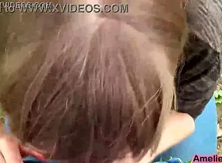 girl sucks boyfriend's cock outdoors sensually and swallows cum.