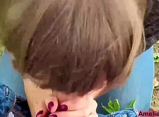 girl sucks boyfriend's cock outdoors sensually and swallows cum.