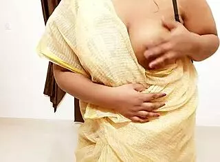 Chubby Asian Aunty Poses for Photo