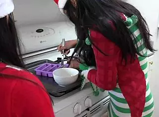Baking Christmas Cookies In Kitchen With Friend And Couple