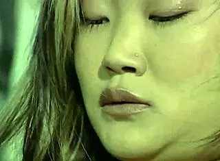 Petite Asian Lucy working out in the gym