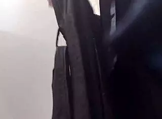 Italian Mother-In-Law Flashes In Leather At Outdoor Store