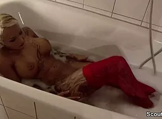 german teen in stockings delivers killer blowjob in steamy bathtub action