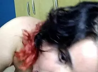 She sucks and deepthroats his cock while playing with her big tits.