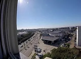 Naked Woman Exposes Herself in Hotel Window Overlooking Airport