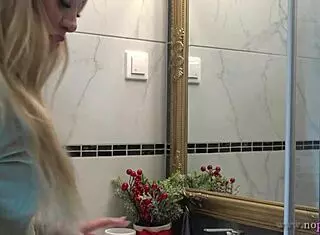 hot new sexy blonde wife switches panties in bathroom solo.