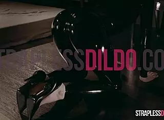 latex covered rossy bush submits to mia reese in a feet and strapon fetish scene