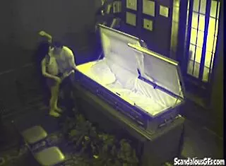 i spied on this couple fucking hardcore in the coffin