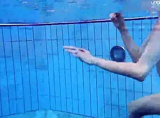 Anna Netrebko, tiny teen, swims underwater in a skimpy bikini at the beach