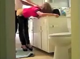 French woman in lingerie interacts with neighbor in kitchen