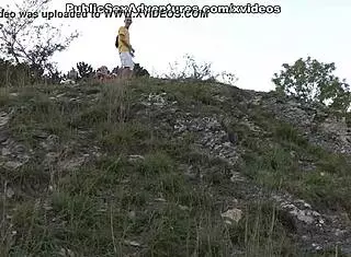 brunette flashes nice tits publicly in outdoor street scene