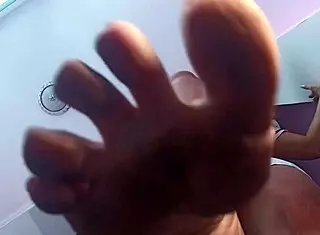 this brunette milf dominates with her dirty feet in a rough bdsm session, close up fetish action