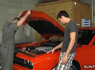 Gay mechanic sucks big cock in garage
