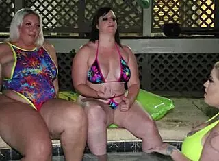 sexy pawgs virgo and big booty pals lick pussy. they dive into hot muff action by the pool.