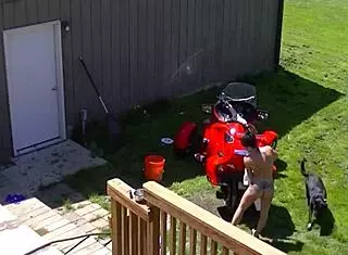 Inked Brunette Cleo Masturbates with Dildo in Garden for Neighbor