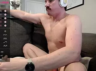 Guy Rides Huge Steelwood Dildo On Cam, Teasing His Monster Cock