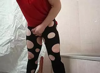 A travesti enjoys using a dildo in this narrative scene with toys.