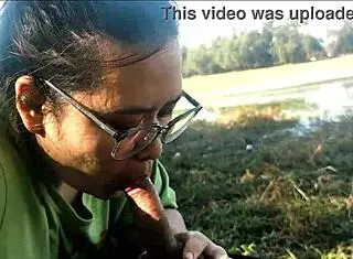 Latina girlfriend gives oral to friend at public lake, leading to orgasm.