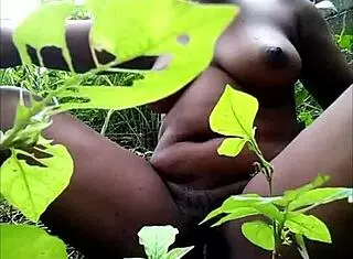 tribal african babe fingering her pussy solo in the woods