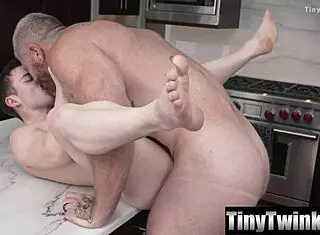 little twink sits tight on bear's huge swollen cock