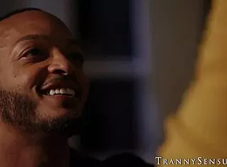 Kinky redhead tranny Rubi Maxim rides huge black cock bare. Intense doggystyle anal action!