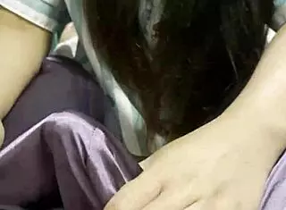 Asian Girl Delivers Stunning Handjob to Boyfriend in Bedroom.