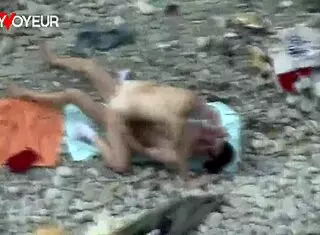 Holy! Beach Voyeur Catches Booty Babe Swallowing Full Mouth of Cum!