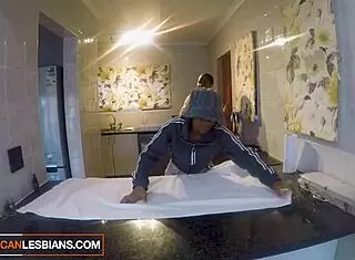 Sexy African college roommates caught scissoring. Hidden camera reveals their steamy session!