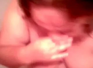 this hot bbw is sucking cock in the bathtub and getting cum on her boobs