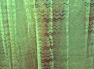 Petite teen moans while fingering tight wet pussy in shower