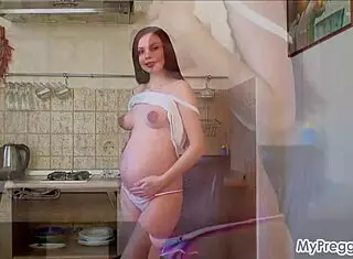 Pregnant Cindy boldly fingers her soaking wet pussy