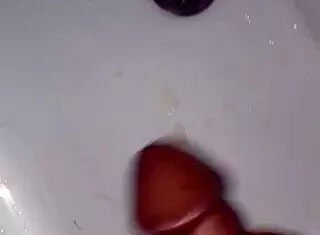 Intense Solo Masturbation Session Ends with Explosive Cum Release