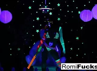 Romi Rain and Dani have bold lesbian fun under black lights