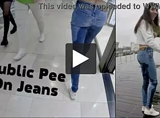 public jeans wetting while strolling through shopping mall