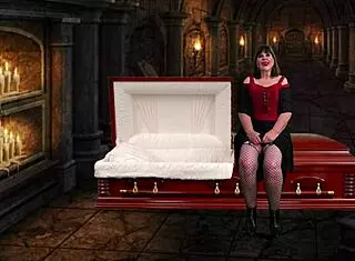 Granny vampyra enjoys strapon stroking sessions.