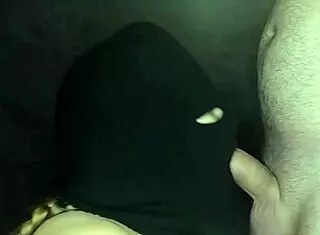 my step sister's hot mouth sucks cock under a hidden balaclava.