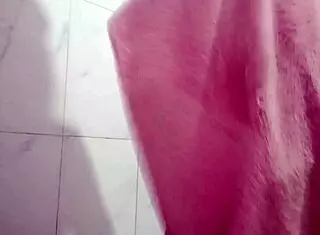 Desi Indian teen shows off her amazing pussy and big tits in this indoor video