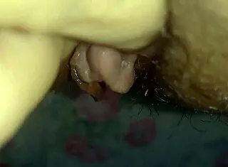 the latina teases her big clit on hairy pussy