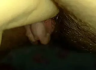 the latina teases her big clit on hairy pussy