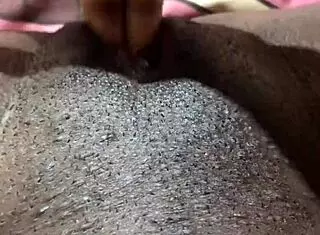 Homemade video of ebony woman enjoying private time alone.